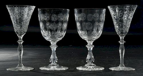 Nine Engraved and Cut Glass Stems