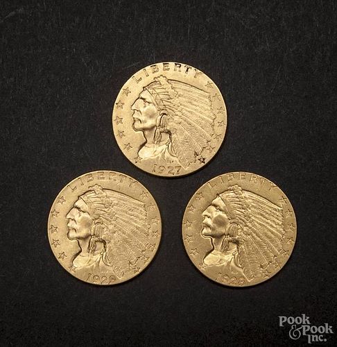 Three Indian Head two and a half dollar coins, to include a 1927, AU, a 1928, AU, and a 1929, AU.