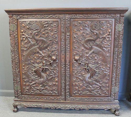 Highly Carved Chinese Hardwood Dragon Cabinet.