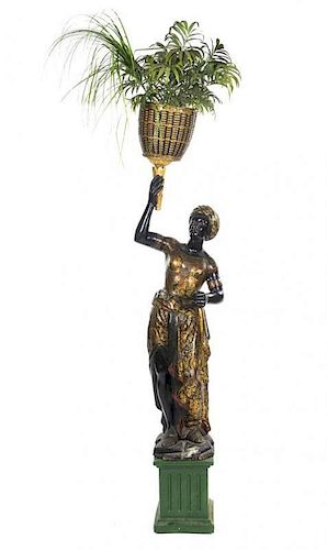 A Venetian Painted and Parcel Gilt Blackamoor Figure, Height of figure 71 inches.