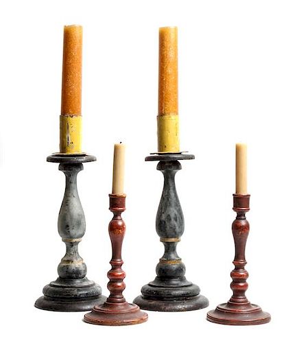 Two Pairs of Carved Wood Candle Stick Holders Height of larger pair 15 3/4 inches