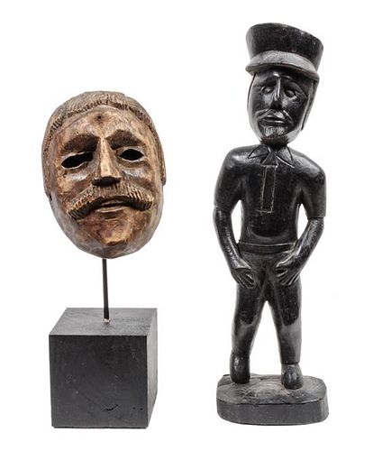 Two Carved Wood Figures of Men Height of tallest 14 1/2 inches