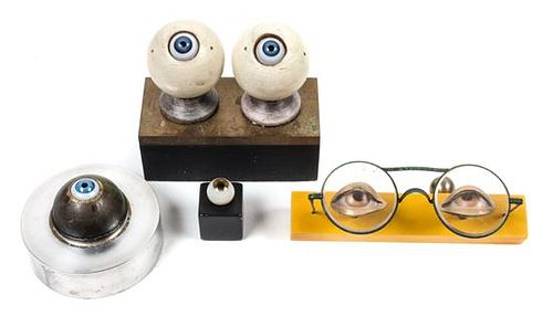Four Optician Models Height of largest 4 1/2 x length 5 1/4 x width 2 3/8 inches