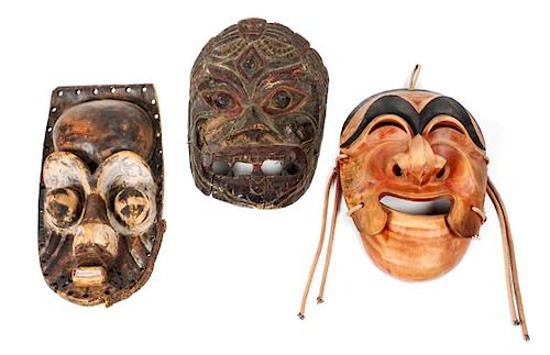 Three Large Decorative Masks Height of largest 16 1/2 inches