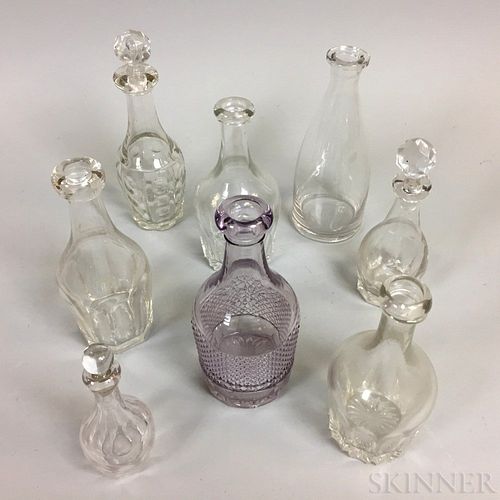 Eight Small Blown Glass Bar Bottles