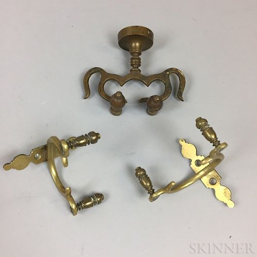 Three Brass Jamb Hooks.  Estimate $300-500
