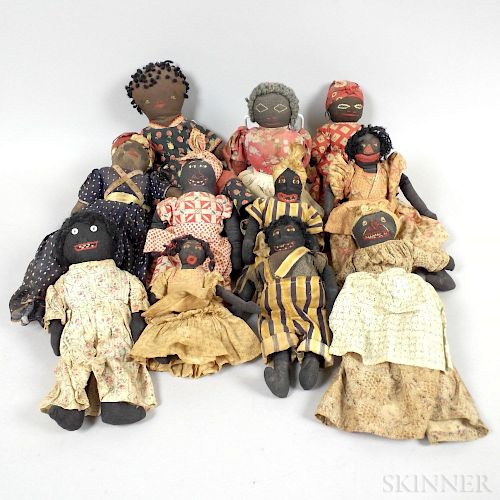 Eleven Folk Art Cloth Black Dolls.  Estimate $400-600