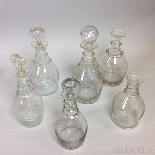 Six Blown Colorless Glass Decanters