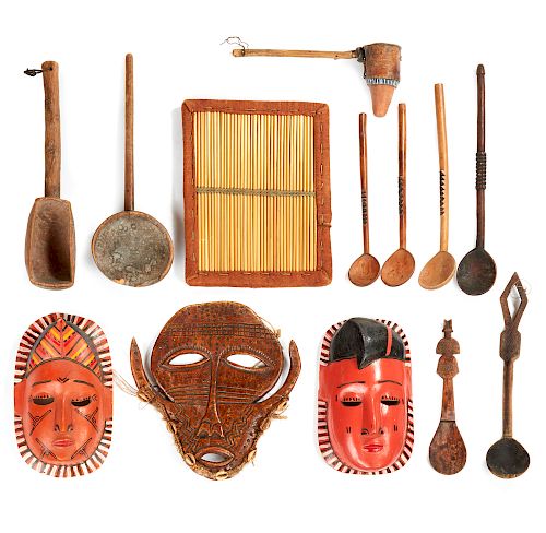 Group of Wood Cooking Utensils, Four Zulu Spoons, a Cow Bone Mask, a Wood Rattle Tray and Two West African Masks