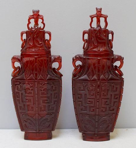 Pair of Carved Chinese Covered Vases.