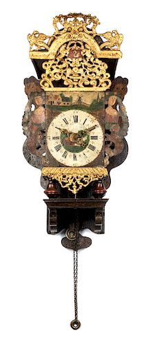 * A Dutch Painted and Gilt Zaandam Clock Height 25 inches.