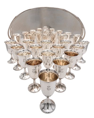 A Collection of Sixteen Sterling Water Goblets, Revere Silversmiths, Brooklyn, NY, each having an engraved script monogram E and