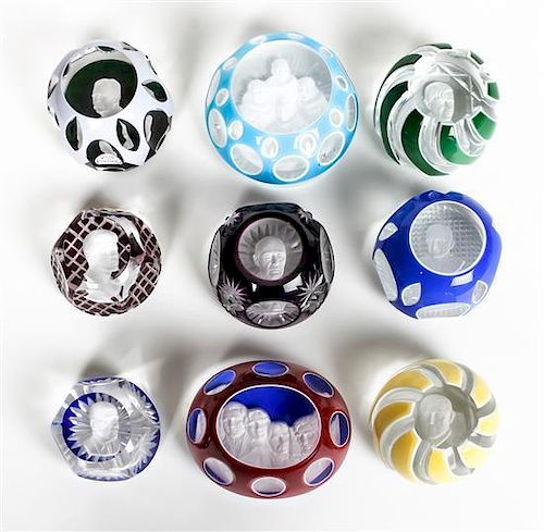 Nine Baccarat Sulphide Paperweights, Width of widest 4 1/8 inches.
