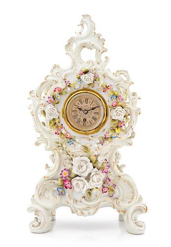 A Continental Porcelain Mantle Clock Height overall 14 3/8 inches.