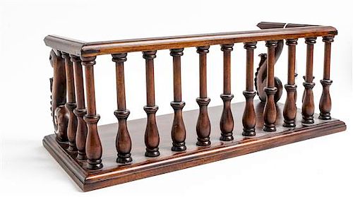 A Mahogany Gallery Height 6 3/8 x width 16 5/8 x depth 7 5/8 inches.