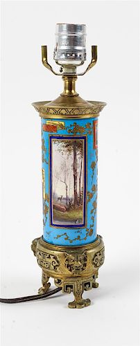 * A French Gilt Metal Mounted Porcelain Vase Height overall 17 inches.