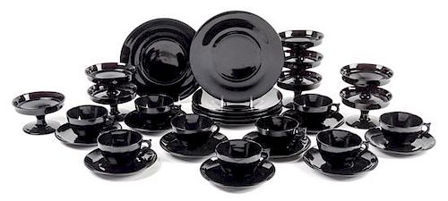 A Large Group of Black Glass Cups and Saucers, 34 total