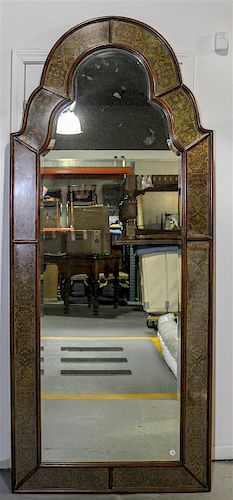 A Walnut and Decoupage Pier Mirror Height 88 x width 38 inches.