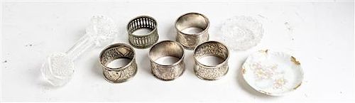 A Group of Four Silver Napkin Rings, various makers, comprising three English examples and a Chinese example, together with a si