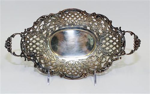 A Dutch Silver-Plate Reticulated Basket, Zilpla, decorated with floral, foliate and C-scroll elements on a pierced lattice groun