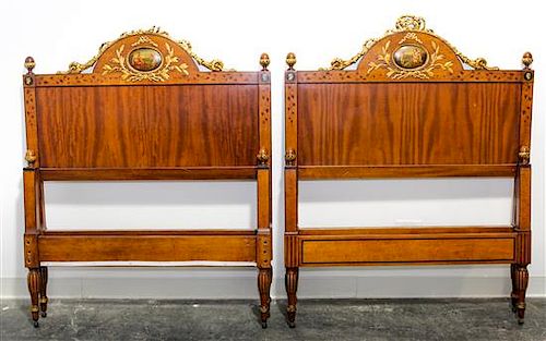 * A Pair of Italian Painted and Parcel Gilt Walnut Twin Beds Height 49 x width 39 1/2 x depth 82 inches.