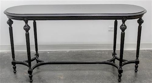 * A Louis XVI Style Ebonized Table Height 30 1/2 x width 59 x depth 20 inches.