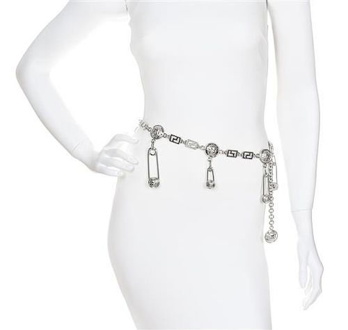 A Gianni Versace Safety Pin and Greco Link Belt,