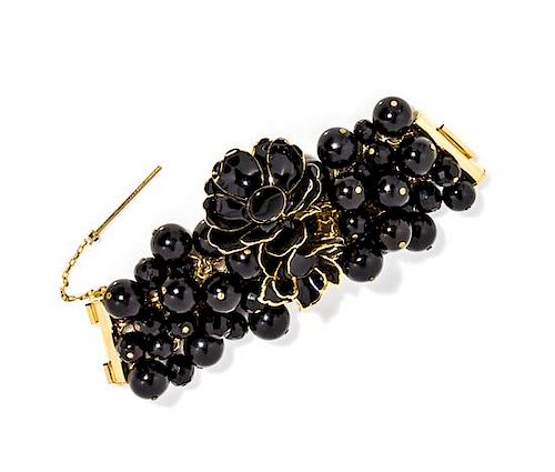 A Gianni Versace Black Bead and Floral Bracelet, 7" x 1.5".