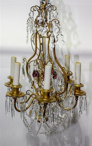 A Gilt Metal Six-Light Chandelier Height 28 inches.