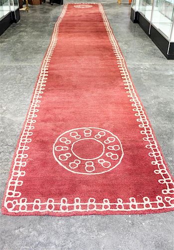 A Chinese Style Wool Rug 26 feet 2 1/2 inches x 4 feet 3 inches.