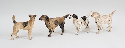 Three Painted Cast-Iron Setters-On-the-Scent Door Stops, and a Painted Cast-Iron Terrier-Form Door Stop