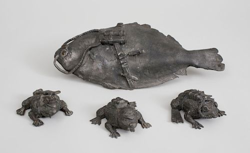 Three Lead Figures of Frogs and a Half-Round Figure of a Flounder