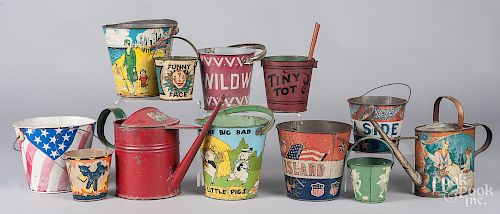 Collection of ten tin litho sand pails, etc.