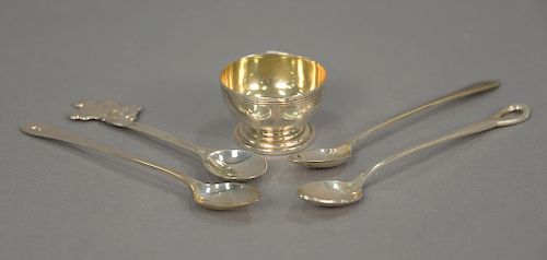 Tiffany sterling silver group to include pair of spoons, baby spoon with bear, nut dish with gold wash bowl, and a spoon with hook h...