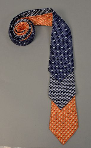 Assorted group of three Hermes silk ties, two with ducks and one with dolphins, #'s 5385OA, 5022PA, & 7964EA..
