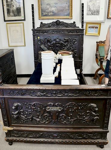 Carved Jacobean style bed (missing finials). ht. 79in., wd. 54in.