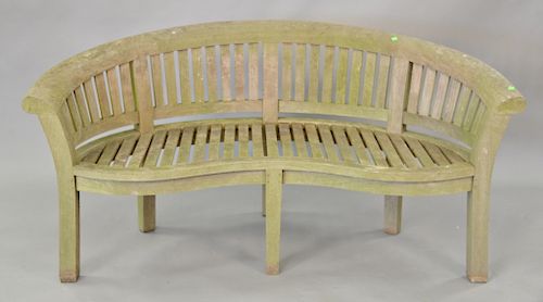Teak curved bench. wd. 68in.