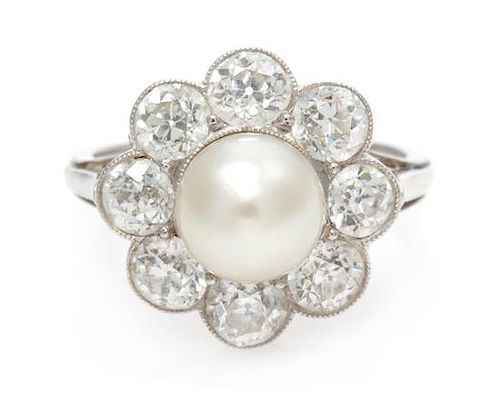 An Edwardian Platinum, Natural Pearl and Diamond Ring, 2.90 dwts.