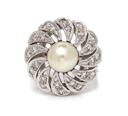 A 14 Karat White Gold, Cultured Pearl and Diamond Ring, 6.20 dwts.