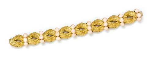 An 18 Karat Yellow Gold and Angel Skin Coral Bracelet, 73.45 dwts.