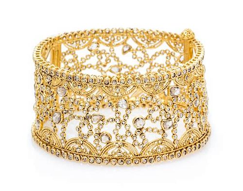 A High Karat Yellow Gold and Diamond Bangle Bracelet, 37.60 dwts.