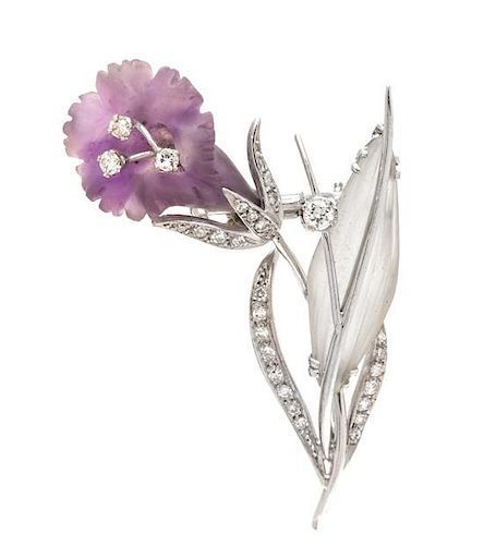 * A Platinum, Diamond, Amethyst and Rock Crystal Floral Motif Brooch, 10.10 dwts.