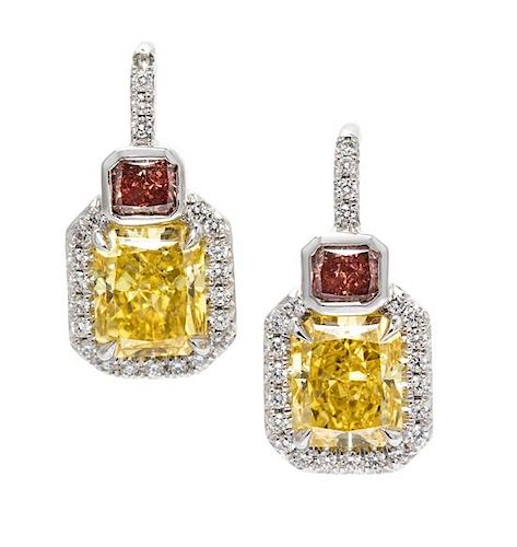 A Pair of Platinum, Fancy Colored Diamond and Diamond Earrings, 3.20 dwts.