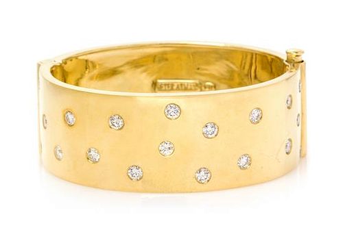 An 18 Karat Yellow Gold and Diamond Bangle Bracelet, 62.25 dwts.