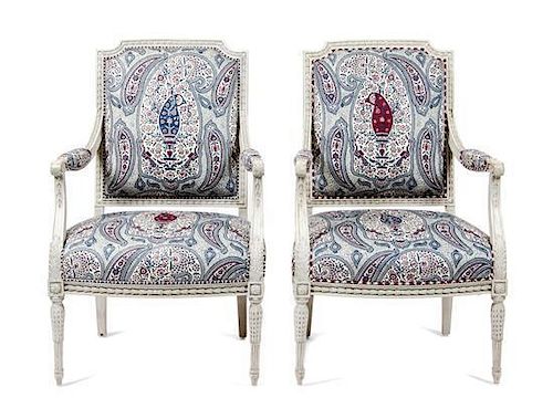 A Pair of Louis XVI Style Painted Fauteuils Height 38 1/4 inches.