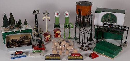 A GROUP OF MODEL TRAIN SWITCHES AND ACCESSORIES