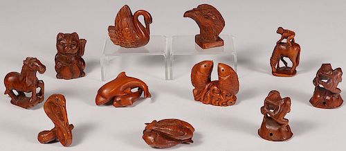 GROUP OF 11 CARVED WOOD NETSUKES, 20TH CENTURY