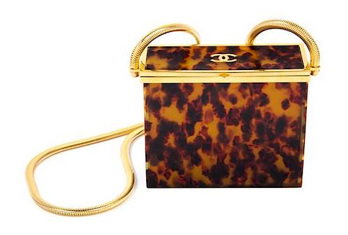 A Chanel Tortoiseshell Evening Bag, 5"x 4.5" x 2"; Strap drop: 22".