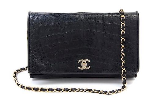 A Chanel Black Crocodile Flap Bag, 10: x 6.6" x 2"; Strap drop: 16".