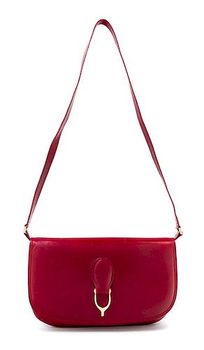 A Gucci Red Leather Flap Handbag, 10.5: x 7" x 1"; Strap drop: 15.5".